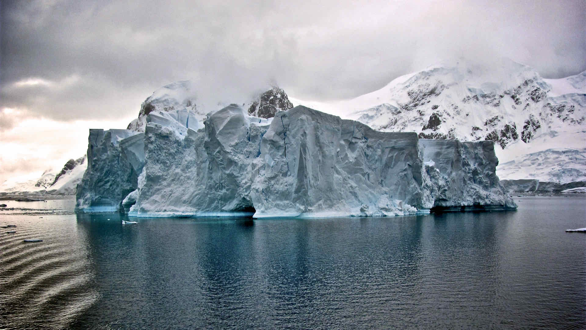 Clouds behind iceberg Clouds behind iceberg